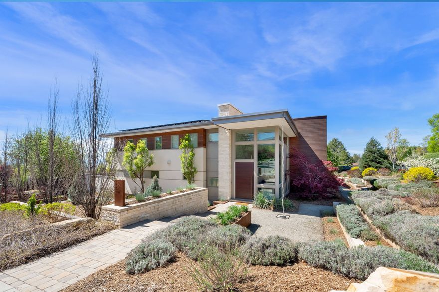 Built in 2012, this 8,000 square foot contemporary Avenues home starts off strong with a glass-walled vestibule with inset floor lighting, a statement chandelier, and a two-story ceiling.  The walls of the living and dining room slide open to the patio and pool and remove the division between indoor and outdoor.   Five of the six bedrooms have ensuites. The one bedroom that lacks a bathroom makes up for it with a private balcony.  This was a show home the Miele used to demonstrate its understated luxury appliances, including a hidden fridge and in-wall coffee maker.  The heated in-ground pool has an automatic cover, so you don't have to worry about your dog in the yard while you are in the basement climbing the rock wall or picking out the right bottle from the wine cellar.  This expansive home in the Avenues isn't just unique because it was one of the filming locations for the horror film Hereditary (worth a google) but also because it is not the kind of home you typically find in the Avenues at all.   The home is amazing on its own. The neighborhood is amazing on its own. But both combined? Mythic.