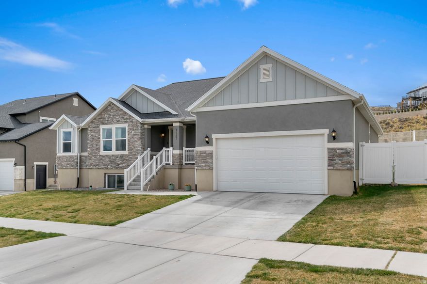 Price Drop!!! If you've been scouring the Saratoga Springs for that "unicorn" listing, this is officially the one. Built in 2020 and carefully maintained, this home sits tucked away in a quiet cul-de-sac where you can actually hear yourself think, though the neighbors are so friendly you might just spend your time chatting instead. The main floor is a masterclass in functional flow, featuring a spacious Primary Suite plus two additional bedrooms and another full bath, all smartly separated from the heart of the home. The living room, with its airy vaulted ceilings, is the ultimate entertaining hub, flowing right into a kitchen that was clearly designed for people who like to host. And because real life is messy, the dedicated mudroom and shoe drop by the garage, complete with a guest-friendly half bath, mean you can finally win the war against daily clutter.  The real magic happens when you step outside, where the backyard opens up to total privacy with no neighbors directly behind you. Whether you're launching the kids onto the in-ground trampoline or soaking in the (almost new!) included hot tub, this space is built for weekend memories. Don't let the sleeping grass fool you; it's just coming out of hibernation and will be lush and green before you know it! When it's time to head downstairs to your fully finished basement, you'll find a massive family room prepped and plumbed for a second kitchen or wet bar, making it the perfect "hangout HQ." The crown jewel is the private theater room, which comes fully loaded with all the equipment and luxury seating included, so just bring the popcorn. With three more bedrooms, another full bath, and enough storage for even the most intense holiday decoration collection, this home hits every note. Reach out to Taylor today to schedule your private tour!