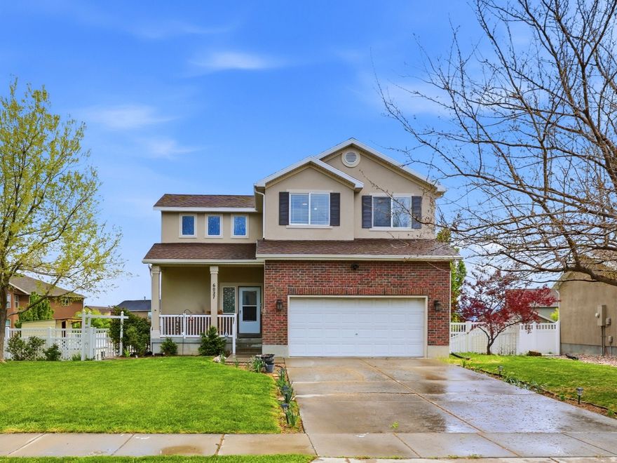 Charming home in the desirable Lakeside subdivision of Stansbury Park. Step inside to a two-story family room featuring a stunning wall of windows that fills the space with natural light and seamlessly brings the outdoors in. The open layout flows into the kitchen, complete with stainless steel appliances and a bay window with sliding door access to the backyard. The spacious primary suite includes a private ensuite bathroom, while the upper level also offers two additional bedrooms and a full bath. The daylight basement expands your living space with a second family room and two more bedrooms, and an additional bathroom perfect for guests or a growing household. Enjoy all that this vibrant community has to offer, including access to the lake and beach, tennis courts, neighborhood park, and scenic walking and biking trails. A community pool is available for a small daily fee (pool and clubhouse access are not included in the HOA). Take a short walk to the Stansbury Park Golf Course for a round or two. Conveniently located just 20 minutes from Salt Lake City with easy freeway access. Square footage figures are provided as a courtesy estimate only. Buyer is advised to obtain an independent measurement.