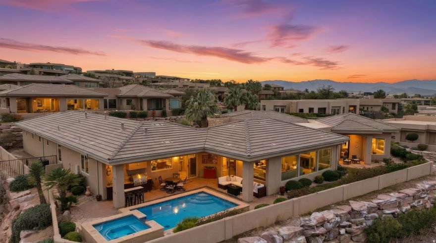 Views that take your breath away. A true paragon, by definition, a model of excellence. And here, the name is no coincidence. This residence embodies elevated living in every sense, from its commanding position above the valley to the panoramic views that define nearly every space. Perched within the guard-gated Stone Cliff community, the home captures unobstructed mountain, red rock, and city vistas that unfold from sunrise to sunset. Pine Valley Mountain becomes a daily focal point, enjoyed head-on from the brand-new pool, creating a private, resort-style sanctuary designed for both serenity and celebration. Set on a premium lot, the architecture is refined and intentional-elegant without excess. Clean lines, abundant natural light, and seamless indoor-outdoor flow create a home that feels both expansive and calming. The thoughtfully designed layout includes four bedrooms, all ensuite, offering privacy and comfort throughout. One bedroom is configured as an attached casita, ideal for guests, multigenerational living, or a private office retreat. Every detail supports an elevated lifestyle rooted in ease, privacy, and beauty. Here, views are not an accessory.... they are the experience, woven into daily living and entertaining alike. Located just minutes from fine dining, Tuacahn, world-class hiking, the airport, and downtown St. George, this home offers the rare balance of seclusion and convenience.  Residents of Stone Cliff enjoy top-tier amenities including 24-hour security, a clubhouse, fitness center, a lap pool, recreation pool, cabanas, pickleball courts, tennis courts, and more.