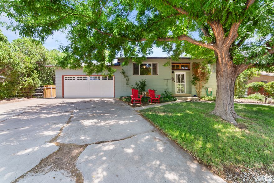 Charming 3-Bedroom Home Near Downtown with Dual Living Spaces and Stunning Backyard!  Located just minutes from downtown, this beautifully maintained 3-bedroom, 3-bathroom home offers the perfect blend of convenience and comfort. Inside, enjoy two spacious family rooms, ideal for entertaining or creating separate living areas. The home also features two washer and dryer areas, providing ultimate flexibility for busy households or multi-generational living.  Step into the lush, shaded backyard with a brand-new oversized patio-perfect for outdoor dining, gatherings, or simply relaxing in your private oasis. A 2-car garage completes the package, offering plenty of storage and parking space.  This property combines a prime location with functional design-don't miss your opportunity to live close to the heart of town with room to spread out!