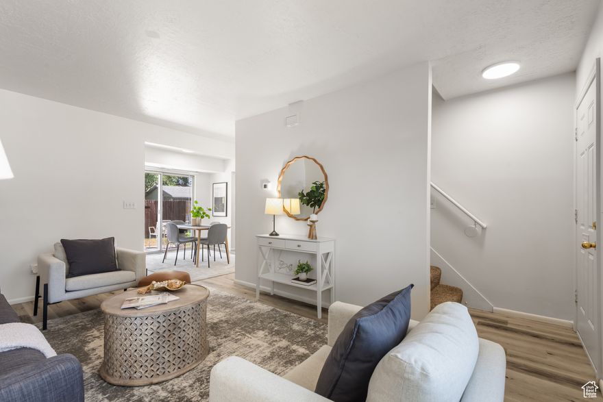 **New Price!** This 4-bedroom end-unit townhome in South Salt Lake could just be the best value in the area. Fresh paint and new flooring throughout create a modern, move-in-ready feel, with updates in the kitchen a brand-new range and microwave plus newer refrigerator and dishwasher. Enjoy the peace of having no neighbors on one side, a smart 2-story layout filled with natural light, and a larger-than-average backyard perfect for relaxing or entertaining. An included Home Warranty, the recently replaced roof and HVAC, gives you peace of mind for years to come. With a one-car attached garage, additional parking, and a $200/month HOA that covers water, sewer, trash, landscaping, and snow removal, this home delivers convenience and value in one package. Don't miss this opportunity-schedule your showing today!