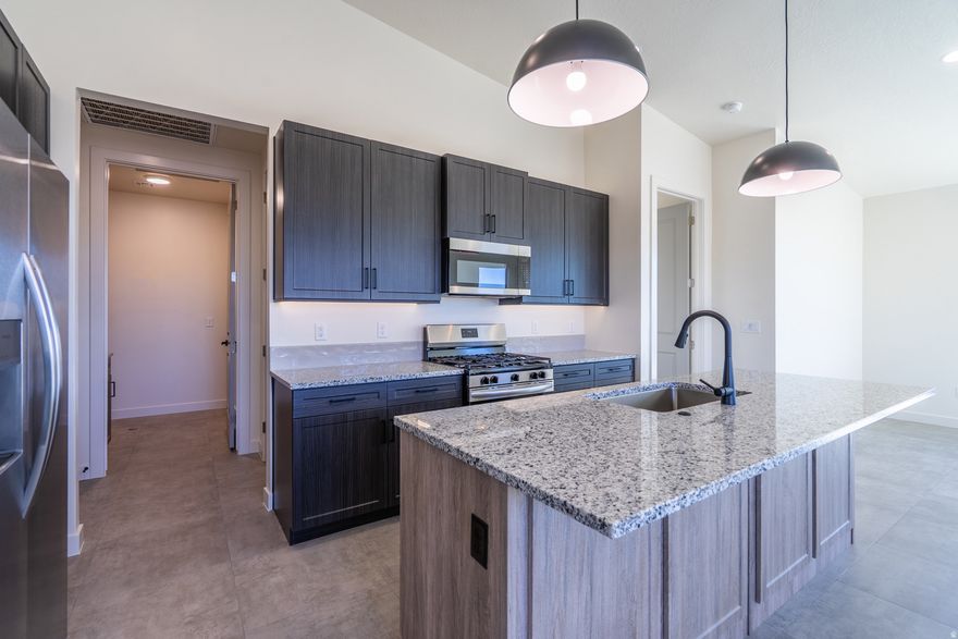 The Aurora. Thoughtfully designed for comfort and style, the Aurora offers a spacious and efficient layout ideal for everyday living, a weekend retreat, or a lucrative rental. This 2-bedroom, 2-bath home features an open-concept living area that seamlessly connects the kitchen, dining, and great room-perfect for entertaining or relaxing. The primary suite includes a private bath and walk-in closet, while the second bedroom is positioned for privacy, ideal for guests or a home office. With abundant natural light, modern finishes, and optional outdoor living upgrades, Community Pool, BBQ area and Play ground coming NOW! Builder warranty, Lender incentive!