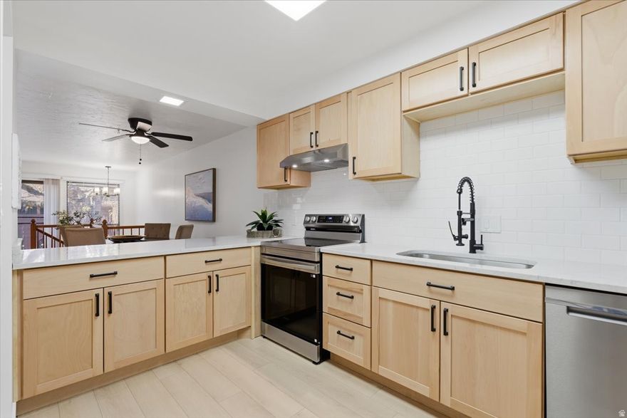 Discover this highly sought-after Millcreek condo-beautifully updated and move-in ready! Step into a fresh, modern kitchen featuring stainless steel appliances, updated bathrooms, and brand-new LVP, tile, and carpet throughout.  With multiple spaces to entertain-your main living area, the cozy basement, or your private patio-you'll have the perfect spot for every occasion. The basement is a total bonus with a wet bar, two office rooms, and even the potential for a second kitchen and/or mother in law apt. Plus, the downstairs bedroom comes complete with its own ensuite for added comfort and privacy.  This fantastic floor plan truly feels like home the moment you walk in. Come see why you'll want to stay! Buyer to verify all information. Square footage from county records.