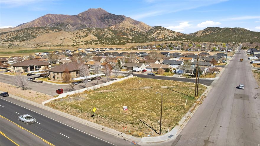 Highly visible Main Street commercial opportunity! This -acre lot offers outstanding exposure in a prime location with steady traffic and easy access.  Whether you're an investor, developer, or business owner, this property provides exceptional flexibility. The seller is willing to sell the land or work with a buyer on a build-to-suit project, creating the perfect space for your business vision.  A rare chance to secure a prominent location and design a building that fits your needs.