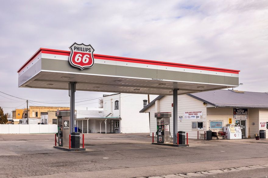 Gas station and convenience store for sale, including both the real estate and operating business. This turnkey opportunity features established operations and is currently performing at approximately a 15% cap rate, with additional upside potential. Located on Main Street in Garland, just outside of Tremonton, this is the only gas station and convenience store in Garland, with the nearest gas station approximately 5 minutes (2.1 miles) away in Tremonton. High-visibility location with ample parking in a close-knit community. A rare opportunity to own a well-established convenience retail asset with minimal competition.