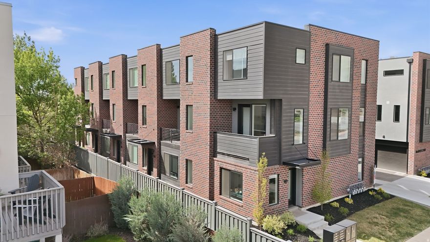 Set in the heart of Marmalade, this modern, quiet end-unit townhome offers rare flexibility and livability just minutes from downtown. Oversized windows fill the home with natural light, while the main living level flows effortlessly for both everyday living and entertaining, complete with a private balcony for a quiet escape. Upstairs, two spacious bedrooms each feature en-suite baths and walk-in closets, creating a comfortable separation of space. A generous flex room adds versatility-ideal for a home office, gym, media space, or easily a third bedroom. Thoughtful upgrades throughout include a custom Venetian plaster accent wall, Tiffany-style overhead lighting, an electric vehicle outlet, and built-in garage storage racks. The two-car garage is a standout feature in the community, offering added convenience and functionality. Enjoy easy walkability to a diverse mix of local restaurants, bars, coffee shops, and the Marmalade Public Library, along with quick access to trails, the airport, and all that Salt Lake City has to offer.