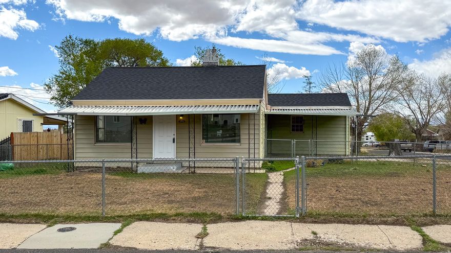 Remodeled cottage with a NEW ROOF in the quiet mountain town of Sunnyside, UT! Sitting on a desirable corner lot, this home offers plenty of space with room for an RV or trailer. The yard is fully fenced for privacy and security, and you'll love the convenient access to endless outdoor recreation right from your doorstep. A perfect blend of comfort, charm, and mountain living. Square footage figures are provided as a courtesy estimate only.  Buyer is advised to obtain an independent measurement.