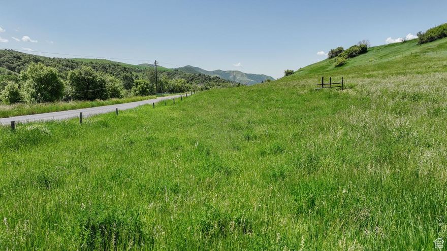 This lot is ready for you to build on and make it your dream property!  Highly sought after Cub River Road with the river across the street.  Build your dream home with a large deck and listen to the river while enjoying the mountain views all around!   Powerbox is stubbed on the property.  Buyer will need to dig a well and put in a septic system.  Buyer is to verify lot size.
