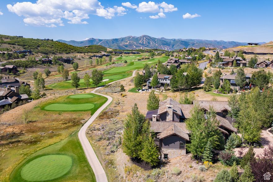 Nestled off the 11th tee box in Tuhaye, this light-filled, sophisticated Mountain Classic home offers privacy, mature landscaping, and stunning Deer Valley views-all within close proximity to the community's amenities. The highly desirable multi-generational floor plan features a serene internal courtyard, ideal for entertaining or pets. Main-floor living includes a spacious Primary suite and an additional en-suite bedroom. The chef's kitchen boasts a walk-in pantry, dual sinks, Sub-Zero refrigerator, and Viking range. Upstairs, two en-suite bedrooms are complemented by a flexible loft space, while the lower level includes another en-suite bedroom and an expansive game room. All bedrooms accommodate king-sized beds. Timeless design, indoor-outdoor flow, 3 car garage and a prime golf-course location make this Tuhaye gem a rare opportunity. The home also comes with a full Talisker Club membership, including the $200,000 deposit.Seller agrees to provide a new DaVinci shingle roof.  Installation is scheduled for late spring 2026.  In lieu of installation,  seller shall provide buyer with a credit equal to the agreed cost of the roof. Seller financing is available.