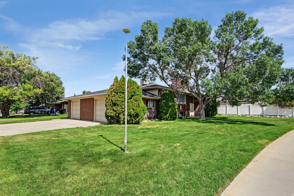 Photo of 1390 W MARINWOOD AVE S, Taylorsville, UT 84123 (MLS # 2186202)