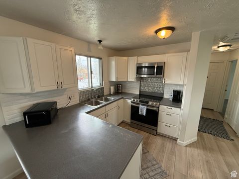 Tiny photo for 4717 S SPICEWOOD CIR W, Taylorsville, UT 84129 (MLS # 2116265)