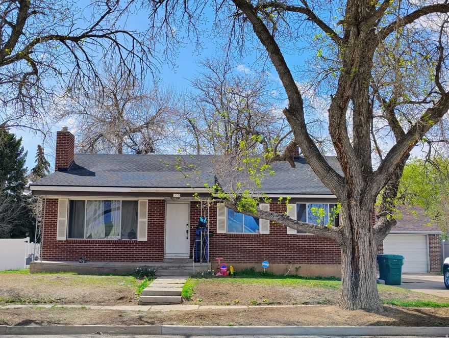 You may enjoy peace of mind in this 5-bedroom, 2-bathroom home featuring a low-maintenance brick exterior. This property has a brand-new roof and furnace for ultimate efficiency and comfort. Inside, you'll find fresh paint throughout many of the rooms, creating a bright and airy atmosphere. Also enjoy a large backyard complete with custom stone pavers, perfect for summer BBQs and outdoor lounging.