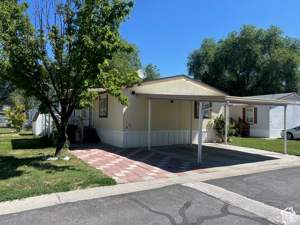 Photo of 7134 W ARABIAN WAY #70, West Valley City, UT 84128 (MLS # 2189805)
