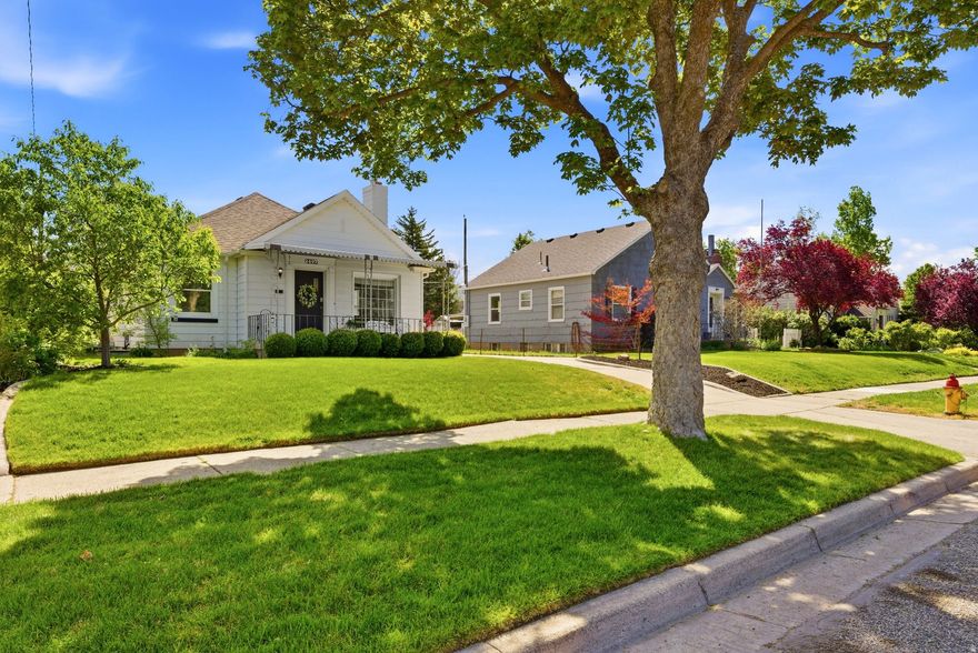 Offers will be responded to by 5:00 on May 12th. Don't miss this rare opportunity to own an adorable cottage home with a full ADU, just a short walk to Sugarhouse Park and countless local shops and restaurants. This home is truly one of a kind and such a find for multigenerational living or as an investment. The newly added private lower-level ADU features quartz countertops, gas oven/range, cork flooring, custom cabinetry with a built-in fridge and additional storage, updated lighting, new carpet, and a charming bathroom with penny tile and a cottage-style vanity. New windows have been properly sized for egress and ingress. Upstairs, you'll find a beautifully updated kitchen with quartz countertops, a new backsplash and sink, newer appliances (with gas hookup available), and updated lighting throughout. Major systems have been thoughtfully maintained, with both the roof and furnace replaced within the last five years. The home also retains its original hardwood floors in wonderful condition, along with solid wood cabinetry that adds to its charm. Additional updates include improvements to plumbing and electrical beyond the ADU, as well as the addition of a water softener. Outside, enjoy a one-car garage with extra depth and added electrical, a covered patio, and a fully landscaped yard with automatic sprinklers and drip lines for garden beds.