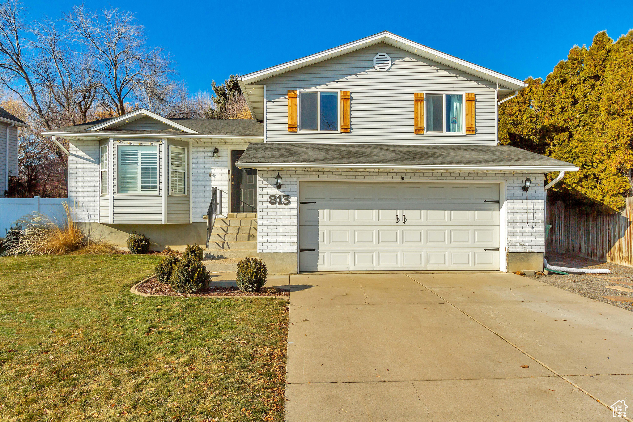 Private showings will become available after the Open House on Saturday February 1st. Don't miss this adorable updated Layton home situated in the desirable Country Creek Estates neighborhood! Families will appreciate the proximity to quality educational institutions including Creekside Elementary, Fairfield Junior High, and Davis High School all within less than 2 miles of the home.  The neighborhood offers convenient access to major transportation routes, including I-15 and Highway 89, facilitating easy commutes to nearby cities and attractions.   Residents can enjoy a variety of local amenities, such as parks, shopping centers, and restaurants, all within a short drive. The area is known for its well-maintained streets and a strong sense of community, making it an ideal place for families and individuals seeking a welcoming environment. Updates include a new microwave, range, and dishwasher in 2023. New roof, AC unit, water heater, sprinkler system, fire pit, updated kitchen and bathroom, new windows and more in 2020!