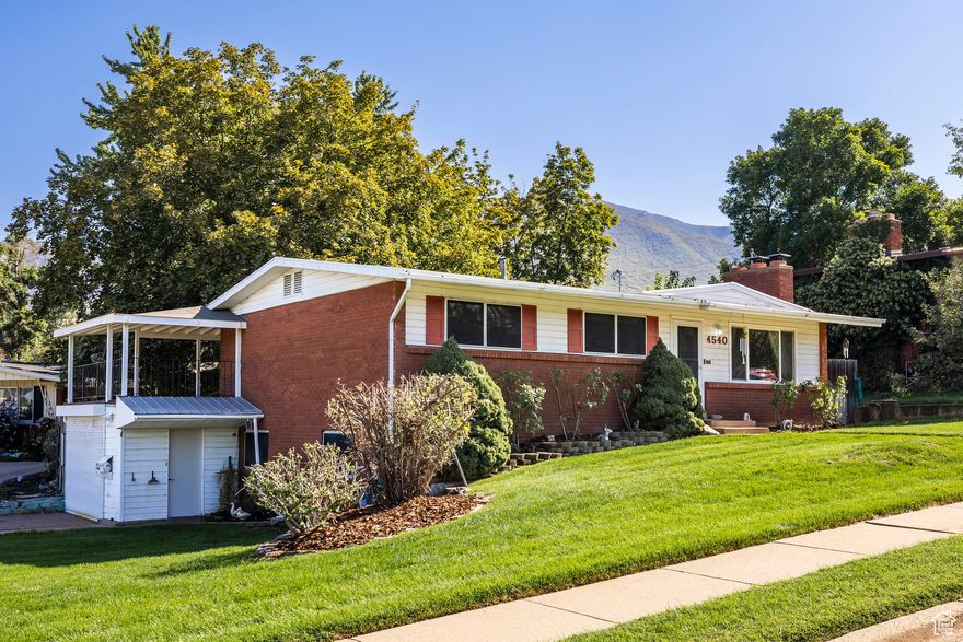 This well-cared-for raised rambler, built in 1962 and thoughtfully maintained over the years, but has room for some additional equity building improvements.. This 2,160 sq. ft. home features 3 bedrooms, 2.5 baths, and two spacious living rooms, giving you plenty of room to spread out and make it your own. Some recent updates have been completed in the basement which include, fresh paint, new laminate flooring, and modern LED lighting.The home has a  walkout basement which adds flexibility for the potential of a multi-generational living, entertaining, or creating a Mother in law space. It sits on a corner .17-acre lot, and is fully fenced. The yard provides privacy and space for pets or play, while the large covered deck is ideal for enjoying the outdoor space.Located just minutes from Weber State University, and all of South Ogdens amenities.