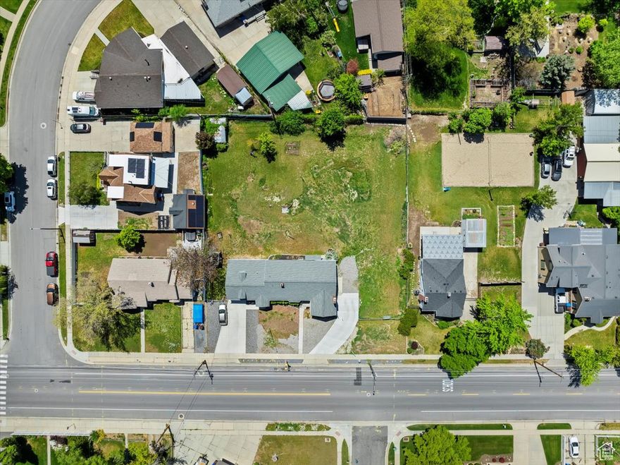 ***HUGE PRICE REDUCTION, GREAT VALUE AND OPPORTUNITY***  Don't miss your chance to own a large, flat lot situated in a highly desirable central location. With convenient access to major roads, shopping, dining, schools, and public transit, the location is unbeatable. Utilities nearby. Bring your vision-opportunities like this don't come around often!  Owner has site plan for a three lot subdivision if house and flat lot are purchased together (agents, please see agent remarks).