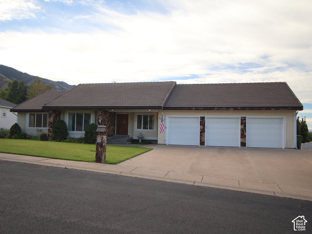 Photo of 1140 WINDSOR DR, River Heights, UT 84321 (MLS # 2187702)