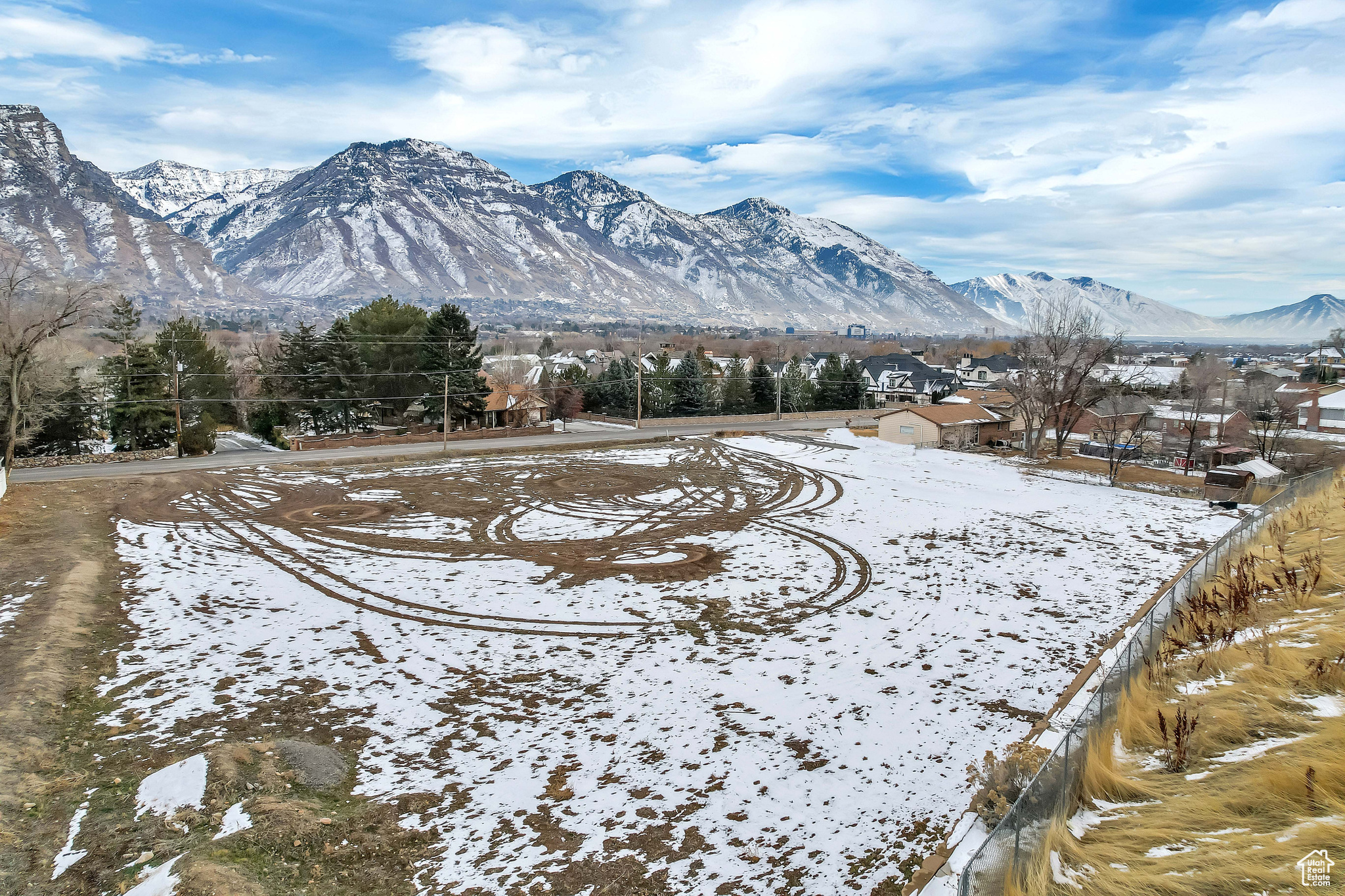 Situated on the prestigious Carterville Road, just outside the South Gate of the Berkshires, this exceptional 1.20-acre lot presents an unparalleled opportunity to create your dream estate in one of Orem's most sought-after locations. Adjacent to Riverside Country Club, this property offers both prestige and convenience, with easy access to premier shopping, dining, and entertainment. Just minutes from University Mall, Trader Joe's, and a short drive to BYU and UVU, this lot provides the perfect blend of privacy and accessibility. All utilities-including water, sewer, gas, and electricity-are connected and stubbed to the lot, ensuring a seamless development process. The expansive lot size allows for versatile use, whether you envision elegant toy storage, a high-end workshop, a private retreat for hobbies, or a distinguished collector's space-offering a level of flexibility that complements the luxury of the setting. With effortless access to I-15, commuting is a breeze while still enjoying the charm of this established and peaceful neighborhood. Opportunities like this are rare-secure your spot in this premier Orem enclave today. Buyer/Buyer's Agent to verify all info.