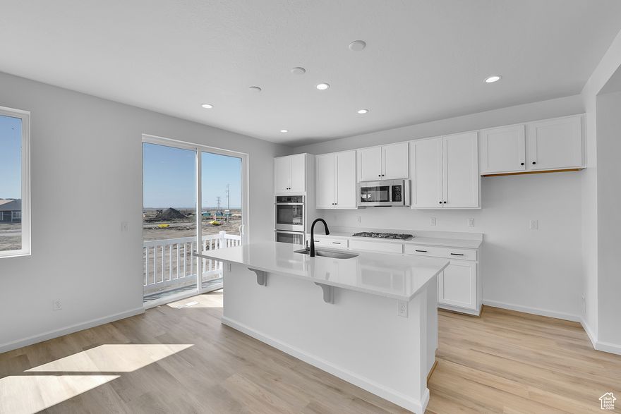 CONTRACT ON THIS HOME TODAY AND QUALIFY FOR A RATE AS LOW AS 3.99% WITH NO COST TO THE BUYER. Restrictions Apply: Contact Us for More Information | The main floor of the beautiful Hemingway plan showcases a generous great room, an open dining area and an inspired kitchen boasting an island and a walk-in pantry. Upstairs, you'll find a versatile loft and four bedrooms, including a lavish primary suite showcasing a spacious walk-in closet and a private bath. Enjoy added convenience with a flex room off the entry, a central laundry and a main-floor powder room. You'll love the designer-curated finishes! Contact us today for more information or to schedule a tour!