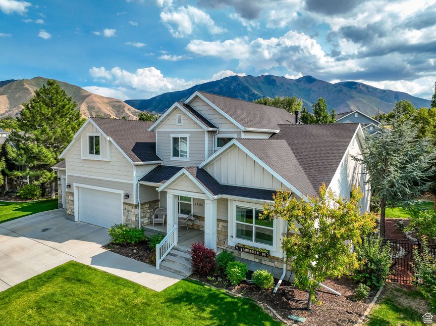 Beautifully updated, open-concept home with an enchanting, tranquil yard and stunning views. The chef's kitchen features stone countertops and light shaker cabinetry, and it flows seamlessly into a bright great room. Large south-facing windows overlook a lush yard and pond. A large primary suite with a walk-in closet and spa-like bath creates a place for daily escape. Flexible main floor space includes a formal living area and an office. A large basement room is plumbed for a kitchenette and has potential as a guest suite or ADU! This home's neighborhood is quiet and well-maintained. A practical corner lot gives additional frontage for easy access. Home is move-in ready and has been professionally inspected and touched-up. Seller may offer a flooring credit with an acceptable offer. Nearby destinations include Hobble Creek and Springville High. This home's heartwarming setting and thoughtful design are the perfect complement to any lifestyle.