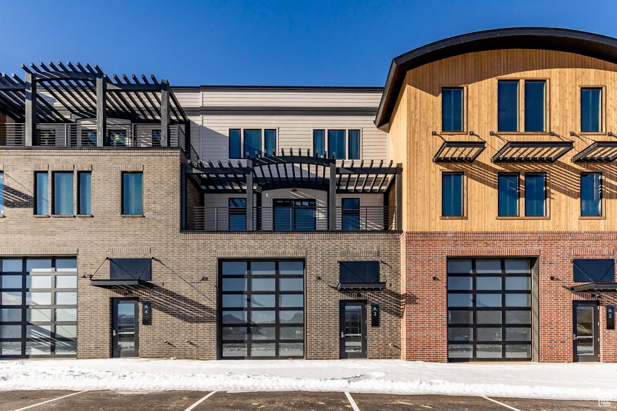 This prime unit at Heber'sMountain View Commons provides maximum flexibility in this newly constructedmixed-use development. This location offers unparalleled accessibility to both Provo and Park City, making it a perfect choice for those looking to capitalize on the region's growth. The property offers unparalleled options with the ability to combineresidential,retail,office,commercial, andwarehousespaces. With approvals already in place for commercial use on the lower two levels and residential use on the top floor, this specific unit providesa significant head start, allowing the next owner to begin development without delay. Designed with versatility in mind, the space features expansive square footage across multiple levels, with generous layouts for commercial or warehouse use, as well as a thoughtfully designed residential space. The property will be delivered as a warm shell, complete with roughed-in electrical and plumbing, insulation on the sidewalls and ceiling, and framed second and third floors-providing a streamlined starting point for your custom build-out. Each end of the units features14-foot glass garage doorsand storefront doors, offering the flexibility to suit a wide range of business or residential needs. Mountain View Commons is conveniently located just30 minutes from Park City ski areas,15 minutes from three reservoirs, and within close proximity to endless outdoor recreational opportunities. With the area's continued growth and the potential this property offers, it's an exceptional opportunity to invest in Heber Valley's future. Plans and permits are available for review and can be fully utilized by the next owner.