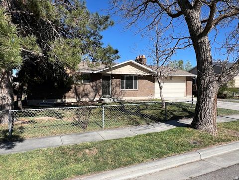 Photo of 5287 S KINGSWOOD DR, Taylorsville, UT 84129 (MLS # 2144957)