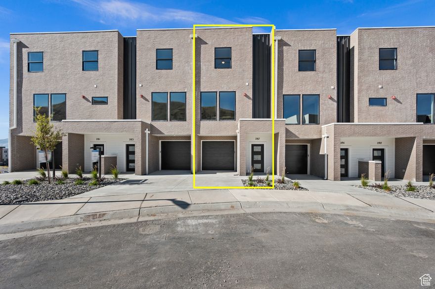 Discover a beautifully crafted 3-bedroom, 3.5-bath townhouse that blends modern comfort with stunning Salt Lake Valley views. This inviting home features premium Anderson 100 Series fiberglass windows that fill every room with natural light, creating a bright and welcoming atmosphere.  The kitchen flows seamlessly into the open living and dining areas, perfect for both everyday living and entertaining. Equipped with a high-end instantaneous water heater, this home offers efficient, on-demand hot water for your comfort and convenience. Parking is a breeze with a 1-car garage and an additional driveway space.  Retreat to the spacious primary suite complete with a private bathroom and ample closet space, alongside two additional bedrooms and full baths that provide versatility for family, guests, or a home office. Ideally located just minutes from outdoor recreation, shopping, dining, and major freeways, this townhouse offers a balanced lifestyle in a sought-after community.  Experience the perfect combination of quality, comfort, and convenience in this charming Salt Lake Valley home.  3D Walkthrough: https://my.matterport.com/show/?m=5iskvEbyiYR