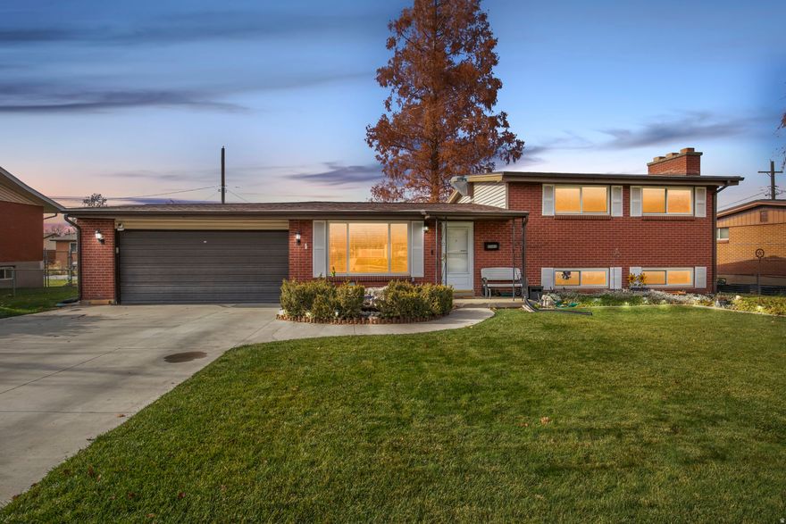 Timeless Charm Awaits in One of Bountiful's Most Coveted Neighborhoods. Nestled on a quiet, tree-lined street in the heart of Bountiful, this brick multi-level has been lovingly cared for by the owner for nearly six decades  a rare opportunity that speaks volumes about the quality and pride of ownership poured into this home. Step inside to a large family room and kitchen, with 3 bedrooms and a bath upstairs, and a large family room and bedroom in the basement. Outside, the curb appeal is simply stunning  mature shade trees, and colorful flower beds frame the home like a postcard from a simpler time. The backyard is an oasis of privacy and beauty, perfect for summer barbecues, gardening, or simply relaxing under the canopy of established trees. Car enthusiasts and hobbyists will fall in love with the oversized 2-car garage featuring a dedicated mechanic's bay  insulated, lighted, and ready for projects big or small. Yes, she's ready for a few thoughtful updates (needs some TLC), but the sellers have priced her aggressively to reflect that  giving you instant equity in one of Bountiful's most desirable, established neighborhoods. Home is being sold as is. If you've been searching for a home with instant equity, rock-solid bones, and the chance to create your forever story in an unbeatable location just minutes from downtown Salt Lake, top-rated schools, and world-class mountain recreation... this is it.  Square footage figures are provided as a courtesy estimate only. Buyer is advised to obtain an independent measurement.