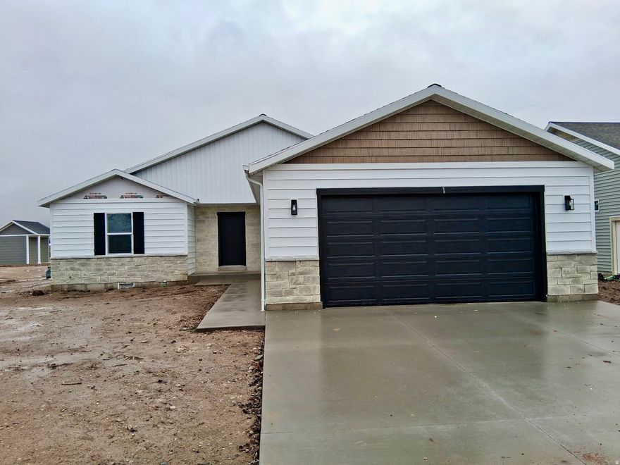 Come see excpetional craftsmanship and modern comfort in this beautiful new construction 4 bedroom, 2 bathroom home. Bright and airy with soaring vaulted ceilings, the open concept living space offers the perfect blend of style and functionality. Spacious primary suite, 3 additional large bedrooms, quality finishes throughout and thoughtful design. Will be completed shortly and ready for you to move in!