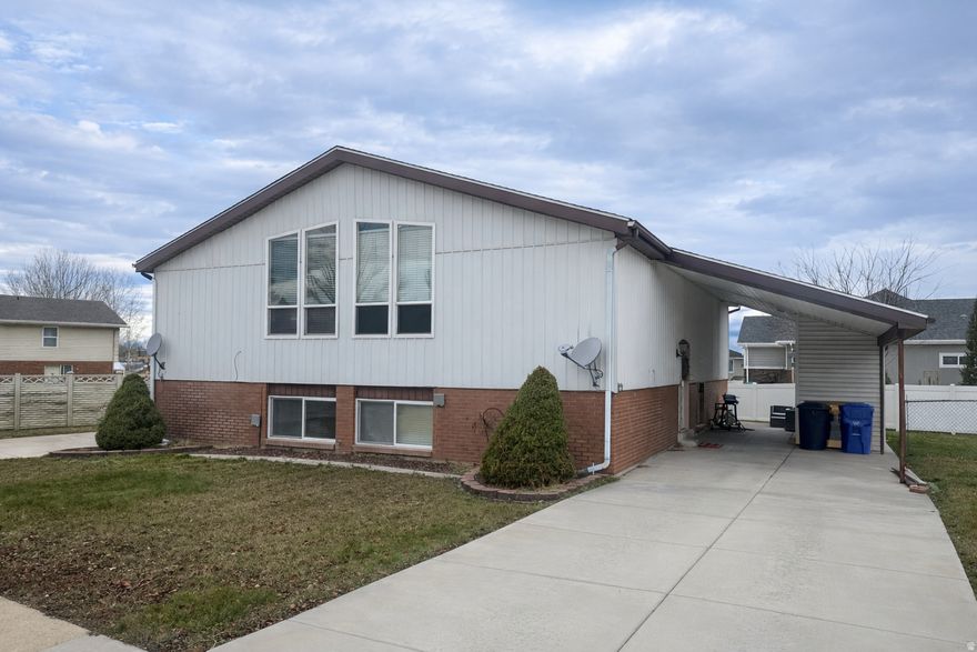 This income-producing duplex has enjoyed virtually 100% occupancy for many years. Each unit offers a spacious and functional layout with 3 bedrooms and 2 bathrooms, highlighted by vaulted ceilings and an open-concept design.  The main level of each residence features a generous living area, a semi-formal dining space, an efficient kitchen, and a primary bedroom with a private full bathroom. The lower level includes a large family room, two additional bedrooms, a full bathroom, laundry area, and ample storage. Both sides benefit from private carports, each with an attached storage closet.  The property sits on a level lot in a sought-after neighborhood conveniently located near the border of Bountiful and Centerville, offering excellent accessibility and long-term appeal. Opportunities like this are rare in such a desirable location.  Please do not disturb the tenants. Square footage figures are provided as a courtesy estimate only. Buyer is advised to obtain an independent measurement.