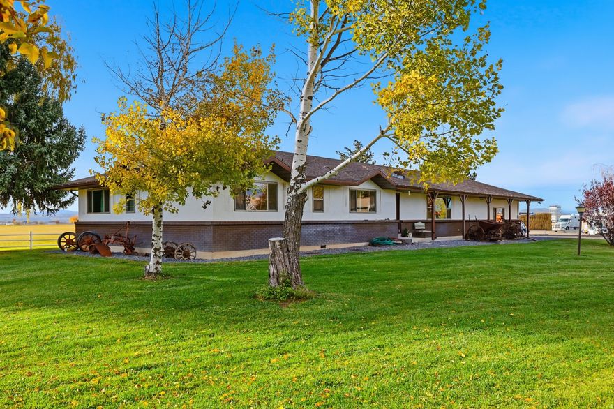 Single-level home on 1.22 acres in a prime West North Logan location! Beautiful updates throughout including new windows, flooring, paint, and a full kitchen and bathroom remodels. Enjoy the open kitchen and family room with a cozy wood-burning fireplace and generous gathering space-perfect for hosting family and friends. This property is fully landscaped with mature trees and a charming creek running along the front and side of the lot. Large floor-to-ceiling windows provide stunning natural light and open to a covered porch to enjoy peaceful western sunsets with no nearby neighboring structures. Spacious bedrooms, a dedicated office, and a large pantry add to the comfort and functionality of this home. Additional features include a private culinary well, propane, septic (recently pumped), and newly improved private lane with fresh asphalt. Looking for more land? The seller also owns the 9.71 acres directly to the north (MLS #2010058) with North Logan's master plan calling for Light Industrial, Commercial, or Agricultural use-ideal for a home-based business, expansion, or investment opportunities. Seller prefers to sell both parcels together but will consider separate sales. Buyer to verify all information. Showings for qualified, permissible buyers only.