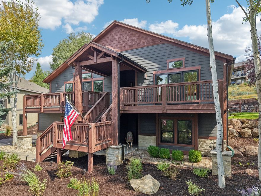Set on a 0.53-acre lot surrounded by mature trees, this meticulously updated Deer Mountain home is move-in ready. The main level offers a spacious open floor plan with living, dining, and kitchen areas, plus the master suite, laundry room, and an additional bedroom. Step outside to the deck, perfect for summer dining, while taking in mountain, ski run, and lift views. The walk-out lower level provides another gathering space along with two bedrooms, ideal for family or guests. A 3-car garage and low annual HOA dues add convenience and value.  Recent updates include a new roof and gutters, Pella windows and exterior doors, Tesla charger, water heater, humidifier system, and A/C unit. Inside, enjoy remodeled bathrooms, new carpet, appliances, fresh paint, and countertops throughout-every detail has been thoughtfully refreshed.   Located at the Jordanelle Reservoir in Deer Mountain, this home offers quick access to year-round recreation and is only 10 minutes from Kimball Junction, Old Town, Deer Valley East Village, and the Uinta National Forest.
