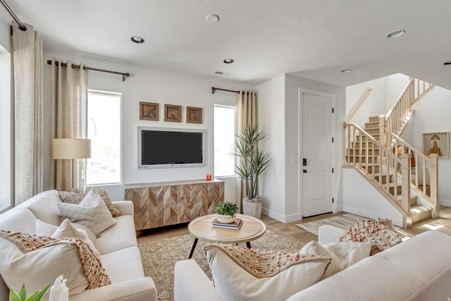 The JEFFERSON Townhome by Woodside Homes! Under construction with a completion date of April 1.  The Jefferson is an end unit, with a welcoming front porch, and tons of windows throughout for natural light.  Main floor features 9' ceilings, upgrades cabinetry with white upper cabinets, and sage green lowers. White quartz countertops throughout, large pantry, waterproof wood laminate flooring on main and white wood railing for even more WOW. Upstairs has even more space with a huge primary suite. Dual sinks in the bathroom with an oversized shower. Spacious walk-in closets and upstairs laundry room make this home a dream. Call/Text to see this home and others from our Move-In-Ready Collection.  Ask about our incredible preferred lender incentives to help make your dream of homeownership an affordable reality. #422 Jefferson.  **Photos are of Decorated MODEL - Actual upgrades/finishes may vary**.  The attached PDF is the color palate for #422.