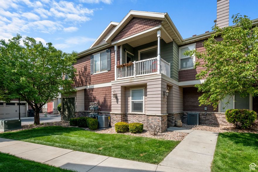 Welcome to Rockwell! This beautifully upgraded 2-bedroom, 2-bathroom townhome with an attached 2-car garage is move-in ready and full of modern touches. Enjoy stylish laminate flooring (installed in 2020), brand-new stainless steel appliances (2024), granite kitchen countertops, and a high-end gas range-perfect for cooking enthusiasts.  Step outside to the covered balcony, ideal for relaxing or enjoying a quiet evening  The spacious primary suite features a private en-suite bathroom and a generous walk-in closet. The Rockwell community offers resort-style amenities, including a pool, fitness center, clubhouse, theater room, two playgrounds, a covered picnic area with grills, and a half basketball court.  HOA dues include water, sewer, trash, Comcast cable, phone, high-speed internet, and landscaping maintenance-giving you both comfort and convenience. Located close to shopping, dining, and with easy access to I-15, this home offers the perfect blend of lifestyle and location. Don't miss your chance to own this exceptional townhome! Mortgage savings may be available for buyers of this listing.