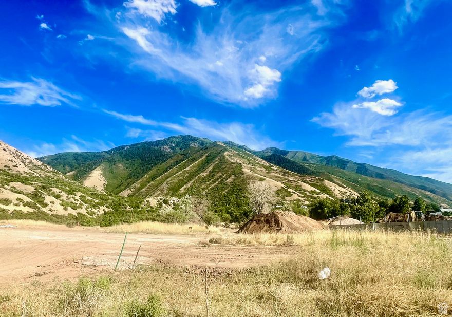 Build your dream home on this stunning lot in Mapleton, Utah! Surrounded by breathtaking mountain views and wrapped in open space, this property offers the perfect blend of beauty, privacy, and small-town charm, with convenient access to nearby trailheads. Don't miss the chance to own a slice of scenic paradise in Utah County. Stubbed and ready, bring your own builder.