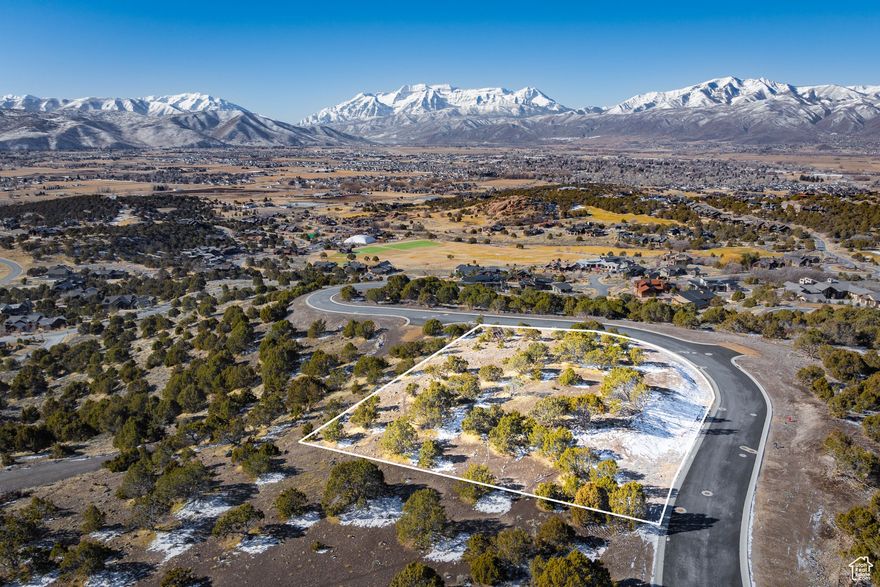 Nestled in the heart of Utah's stunning Wasatch Mountain Range, this exceptional Red Ledges custom homesite offers breathtaking panoramic views of the surrounding peaks, creating the perfect setting for your dream mountain retreat. Located in one of the most sought-after private communities in the region, this homesite provides an unparalleled opportunity to design and build a custom home that blends seamlessly with the natural beauty of the landscape. Red Ledges is renowned for its world-class amenities and luxurious mountain lifestyle. As a homeowner, you'll enjoy exclusive access to a Jack Nicklaus Signature Golf Course, designed to challenge and inspire golfers of all skill levels. For those who prefer a more relaxed game, the community also features a stunning 12-hole Golf Park, perfect for casual play with family and friends. Beyond golf, Red Ledges offers a state-of-the-art clubhouse with fine dining, a full-service fitness center, and a resort-style pool, providing the perfect balance of recreation and relaxation. Outdoor enthusiasts will appreciate the extensive trail system for hiking, biking, and horseback riding, as well as year-round activities like skiing at nearby Deer Valley Resort, accessible via Red Ledges' private ski shuttle. The community also boasts premier tennis and pickleball facilities, along with a vibrant social calendar that fosters a close-knit, welcoming atmosphere. With its unbeatable combination of natural beauty, luxurious amenities, and an ideal location just minutes from Park City, this Red Ledges custom homesite is the perfect place to build your mountain dream home.