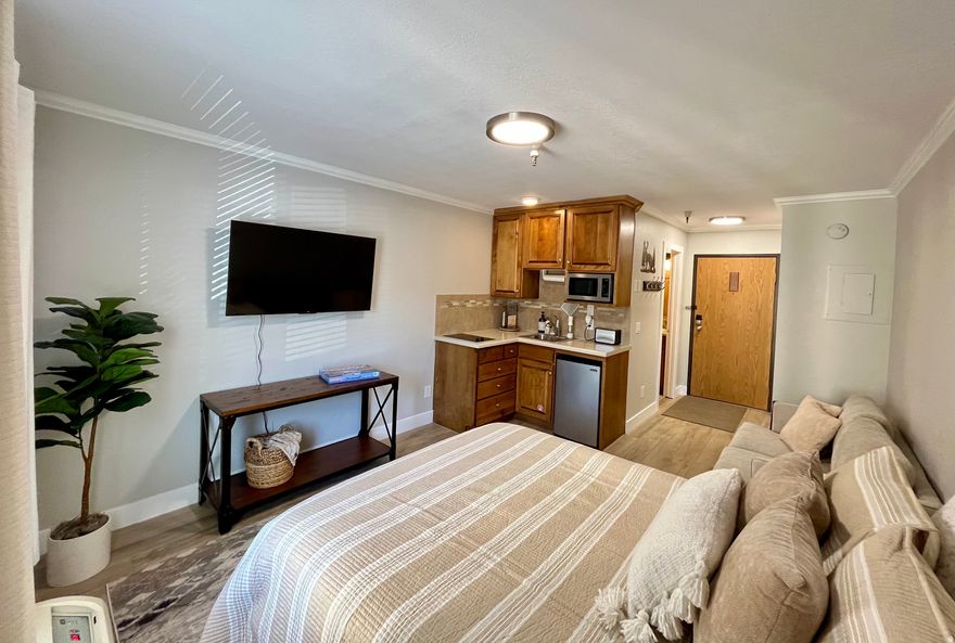 Park City get away! Recently updated. Close to restaurants, stores, and all outdoor activities. Currently being used as an Airbnb. Being sold furnished. Onsite amenities include elevator, laundry, pool, hot tub, Minutes from ski resorts, hiking/biking trails. City bus system is easy to access. Square footage per county record. Buyer to verify all.