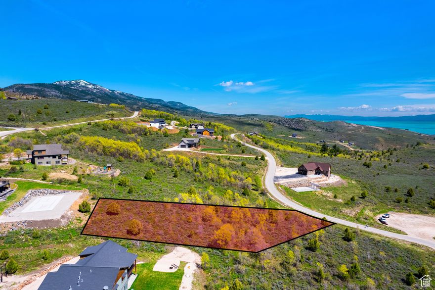 Stunning 1-acre lot in the sought-after Shundahai subdivision, offering panoramic views of Bear Lake and the surrounding mountains. Short Term Rentals Allowed. This property is a haven for nature lovers, with mature trees and a beautifully wooded setting that provides both privacy and natural charm. The lot features a gentle, lake-facing slope, making it ideal for a walk-out basement design that seamlessly integrates indoor living with the great outdoors. With open space nearby and breathtaking scenery in every direction, the property feels even more spacious-perfect for crafting your dream mountain getaway or vacation retreat. You'll enjoy easy, year-round access via paved roads, and you're just 10 minutes from Bear Lake's North Beach and a short drive to nearby ski resorts, making it a perfect base for both summer and winter adventures. This is more than just a building lot-it's your chance to create something truly special in one of the Bear Lake area's most desirable communities. The seller is open to all offers-bring yours today!