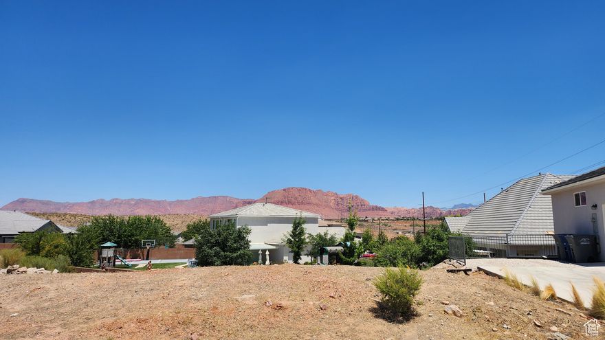 Walkout basement lot in the Hills at Santa Clara. North/South orientation. Amazing views of the Ivins Red Mountain and Snow Canyon State Park. RV Garage or RV parking option. lot is 167 Feet wide.