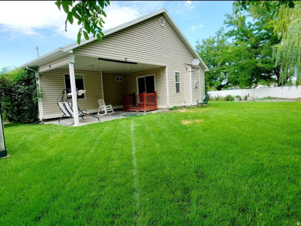 Photo of 863 COUNTRY CLUB DR, Stansbury Park, UT 84074 (MLS # 2145847)