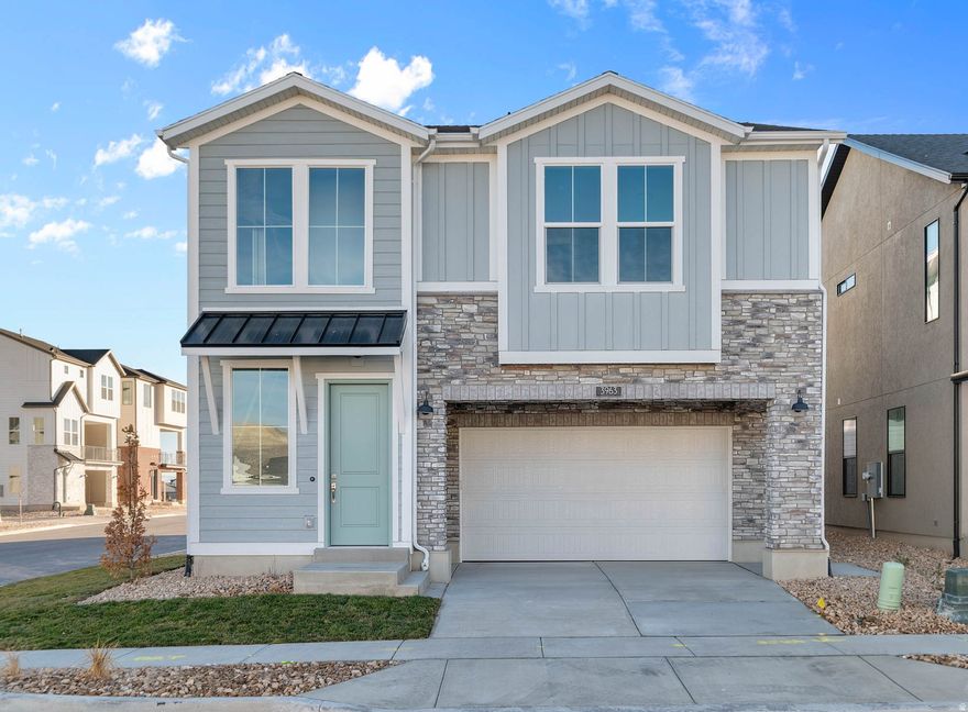 Come see this beautifully designed Sundance Farmhouse, featuring a bright and welcoming interior with thoughtfully selected finishes. The kitchen showcases gray laminate cabinets, sleek quartz countertops, a tile backsplash, and stainless steel gas appliances, creating the perfect blend of style and function. Durable laminate hardwood, vinyl tile, and carpet flooring flow throughout the home, complemented by fresh 2-tone paint and classic Craftsman base and casing. Additional convenience comes with Christmas light outlets, a tankless water heater, and other energy-efficient features. The staircase is accented with a warm wood railing, adding to the home's farmhouse character. In the owner's bathroom, enjoy a spa-like retreat featuring quartz shower surrounds and elegant satin and brushed nickel hardware. This home offers timeless charm paired with modern comfort!