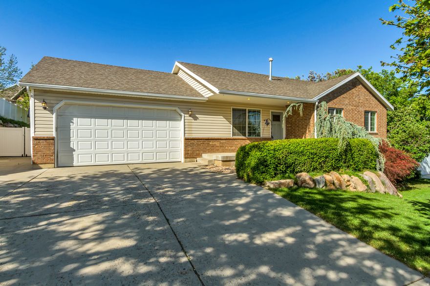 Immaculate 5-bedroom, 3-bath home with updates throughout! Featuring a newer roof, updated kitchen, paint, and flooring, water heater, water softener, and a brand new refrigerator and microwave.   This home is perfect for entertaining with spacious gathering areas inside and out. Enjoy the beautiful yard complete with a pergola, mature trees, and plenty of shade for relaxing summer evenings.  The fully finished basement adds even more living space and flexibility for family, guests, or hobbies.  A true move-in-ready home you won't want to miss!    Square footage figures are provided as a courtesy estimate only and were obtained from county records. Buyer is advised to obtain an independent measurement.