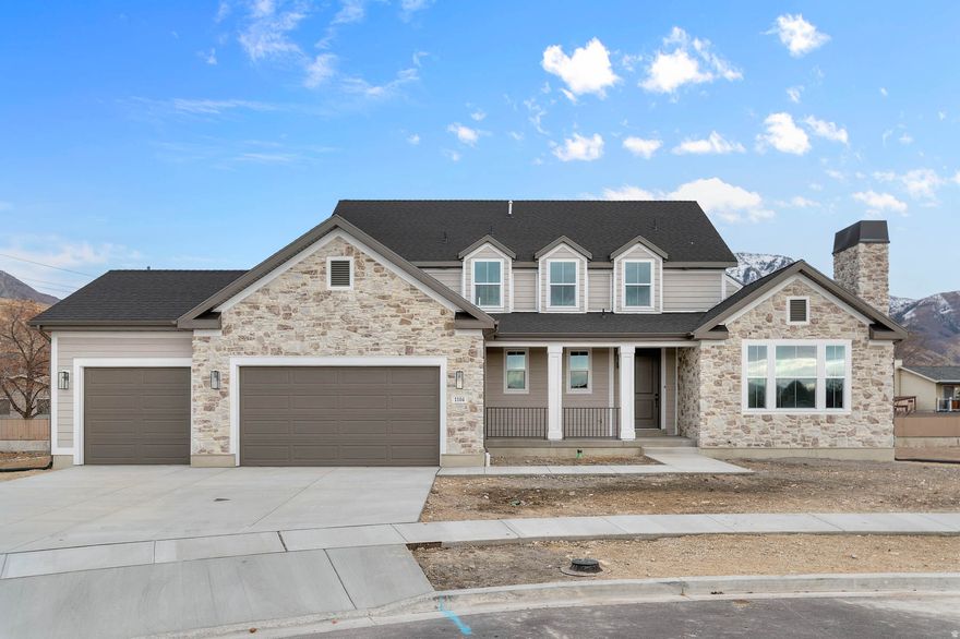 Gorgeous upscale Hampton Traditional 2 story home in a sought after Orem location!  This home features it all! Structural features include an expanded 3 car garage with exit door, 9 foot basement foundation walls and a patio off the rear deck. Inside you will find a spacious great room accented by a ceiling fan, 2 tone paint, textured walls, large craftsman base & casing, motion sensor switches for easy lighting, and gas log fireplaces providing a cozy space in the great room & living room. The kitchen includes all your culinary need such as custom cabinetry with led lighting, stainless steel gas appliances with double ovens and quartz counters with extended height tile backsplash. The bathrooms provide an elegant retreat with quartz counters, tile surrounds and black matte hardware. Durable flooring includes laminate hardwood flooring, carpet and tile throughout. You do not want to miss out on the beautiful home! Come check it out today!