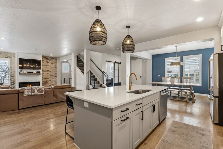 Rarely does a home combine this level of space, thoughtful customization, and outdoor living. The open-concept main floor offers a breathable layout ideal for both everyday living and entertaining, anchored by a standout kitchen featuring ceiling-height cabinetry, undercabinet lighting, custom pullouts, and a beautifully designed pantry. A private office with custom built-ins adds flexibility and organization.  Upstairs showcases a rare four-bedroom floor plan with an oversized owner's suite, while many bedrooms include walk-in closets with custom organization and built-in dressers. The finished basement adds two additional bedrooms, including a dedicated gym, providing versatile living options.  Outdoor spaces truly set this property apart - enjoy a welcoming front porch with multiple seating areas and an extraordinarily large backyard featuring a sprawling concrete patio anchored by a stunning wood pergola, a combination rarely found in the area.  Homes offering this blend of functional space, meaningful upgrades, and intentional design are seldom available. Owner/Agent