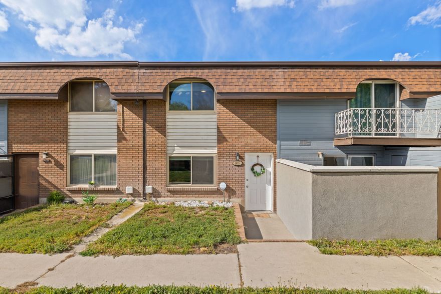 **No showings until the Grand Opening - Open house on Saturday 4/11/26, from 11-2pm)**  Well-located Provo townhome with easy freeway access and direct proximity to public transit, making commuting simple in any direction. Inside, the layout is functional and comfortable, with a spacious main living area, two generously sized bedrooms, and 1.5 bathrooms, including a full bath upstairs with double vanity and a convenient half bath on the main level. The home features updated flooring, a bright kitchen, and a private outdoor space that opens to the community green area which is ideal for relaxing or entertaining. One bedroom includes its own private deck, adding an extra layer of flexibility and outdoor access! Residents enjoy private gated entry to Paul Ream Wilderness Park and the Provo River Trail, offering miles of walking, biking, and open space just steps from the property. The HOA covers a wide range of utilities and services, keeping ownership simple and predictable, while shared laundry facilities add convenience within the community.  Whether you're looking for a primary residence or a strong, low-maintenance investment opportunity, this location and setup check the boxes!