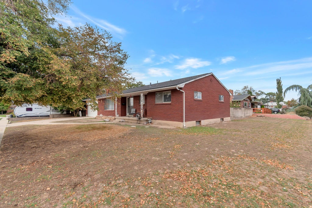 Photo of 258 W HARRISON ST S, Midvale, UT 84047 (MLS # 2186777)