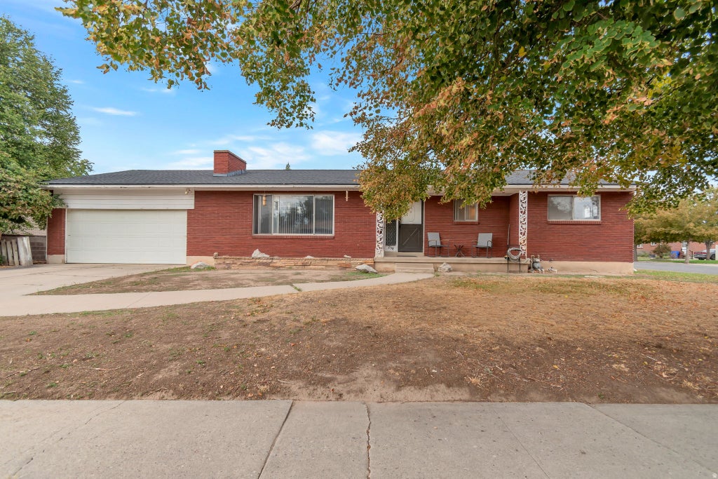 Photo of 258 W HARRISON ST S, Midvale, UT 84047 (MLS # 2186777)