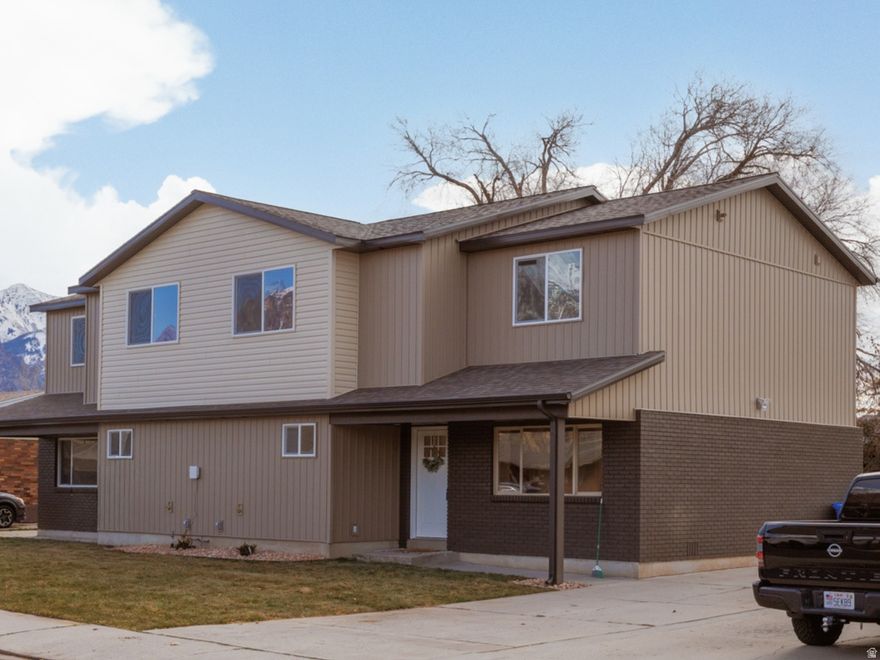 With NO HOA fees and a generously sized backyard, this townhome offers a significant cost-saving advantage. The beautifully rebuilt property is truly one of a kind. While the 1975 brick exterior wall remains, everything else is brand new. What was once a single-story rambler is now a completely reimagined two-story home featuring 4 bedrooms, two family rooms, and a fully reconfigured main level with an all new second story.  Enjoy a stunning kitchen with an over sized island, a large fenced backyard, and touches of personality throughout. From the second floor, take in an unobstructed view of Mount Timpanogos. Located on a quiet street in central Orem, you'll be close to shopping, schools, parks, UVU, BYU, and Provo Canyon.  Construction will be finished shortly after Thanksgiving, with an open house planned at that time-but you're invited to walk the property now. Call for details and a tour. Both sides of the townhome are available: the east side (241 West) will be completed approximately seven days after the west side (243 West).